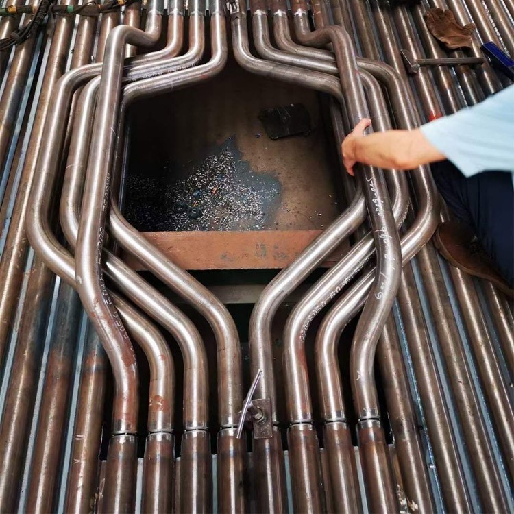 Φ38.1×7.5 SA-213T2 每件9根水冷壁管一排，長(zhǎng)12米，管節(jié)距50.8mm,鰭片連接，鰭片為膜式扁鋼厚δ6.4㎜，材料為15CrMo，采用雙面坡口焊接型式